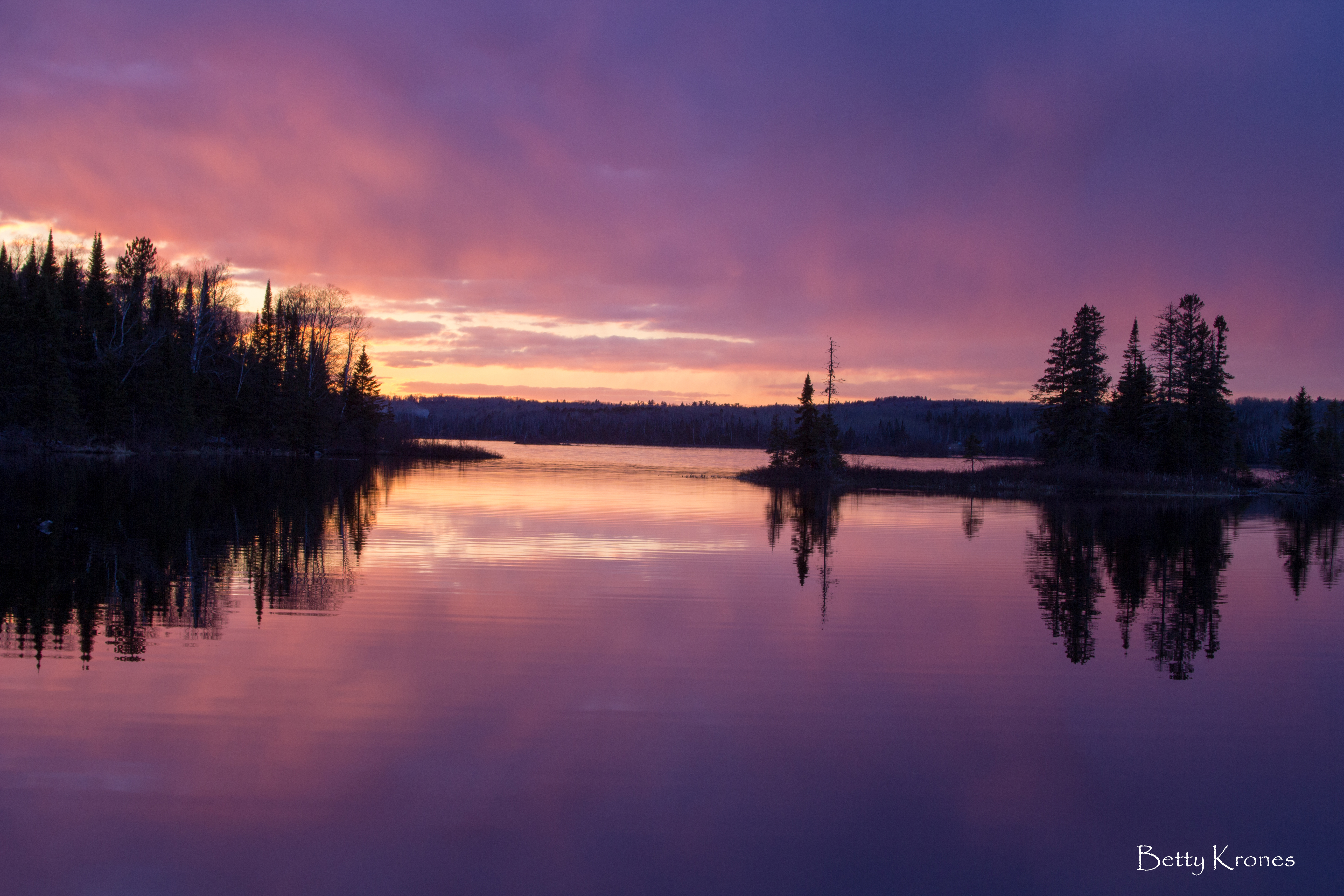 purple sky reflected in water